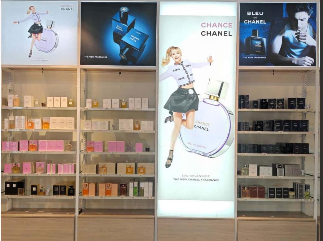 Chanel fragrance wall, Palmerola departures store